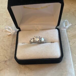 Stunning Sterling Silver Ring with Five Lab Created Diamonds. US 7.5